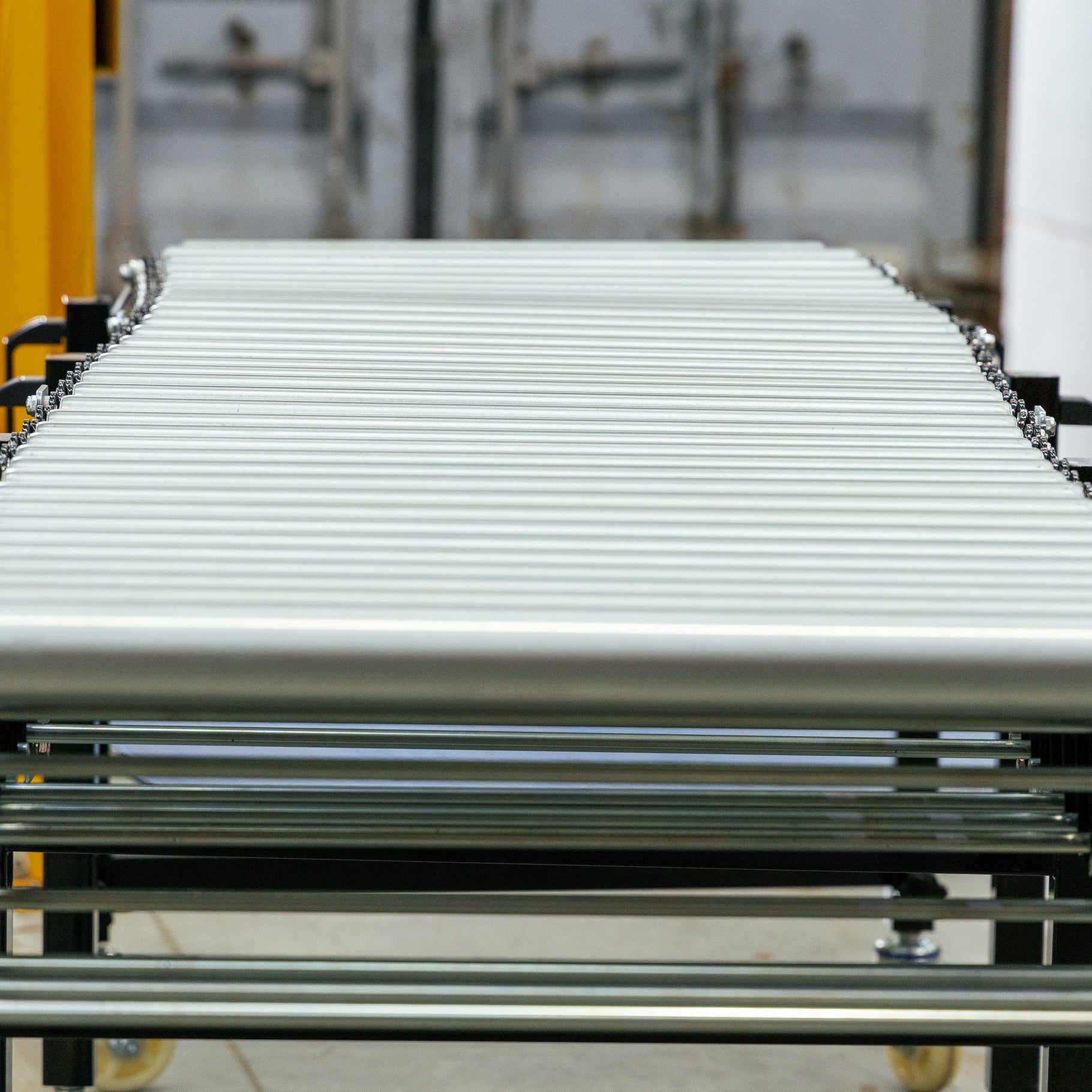 Expandable Steel Roller Conveyor 460mm W x 1.5-4.0m L - Omni Packaging 