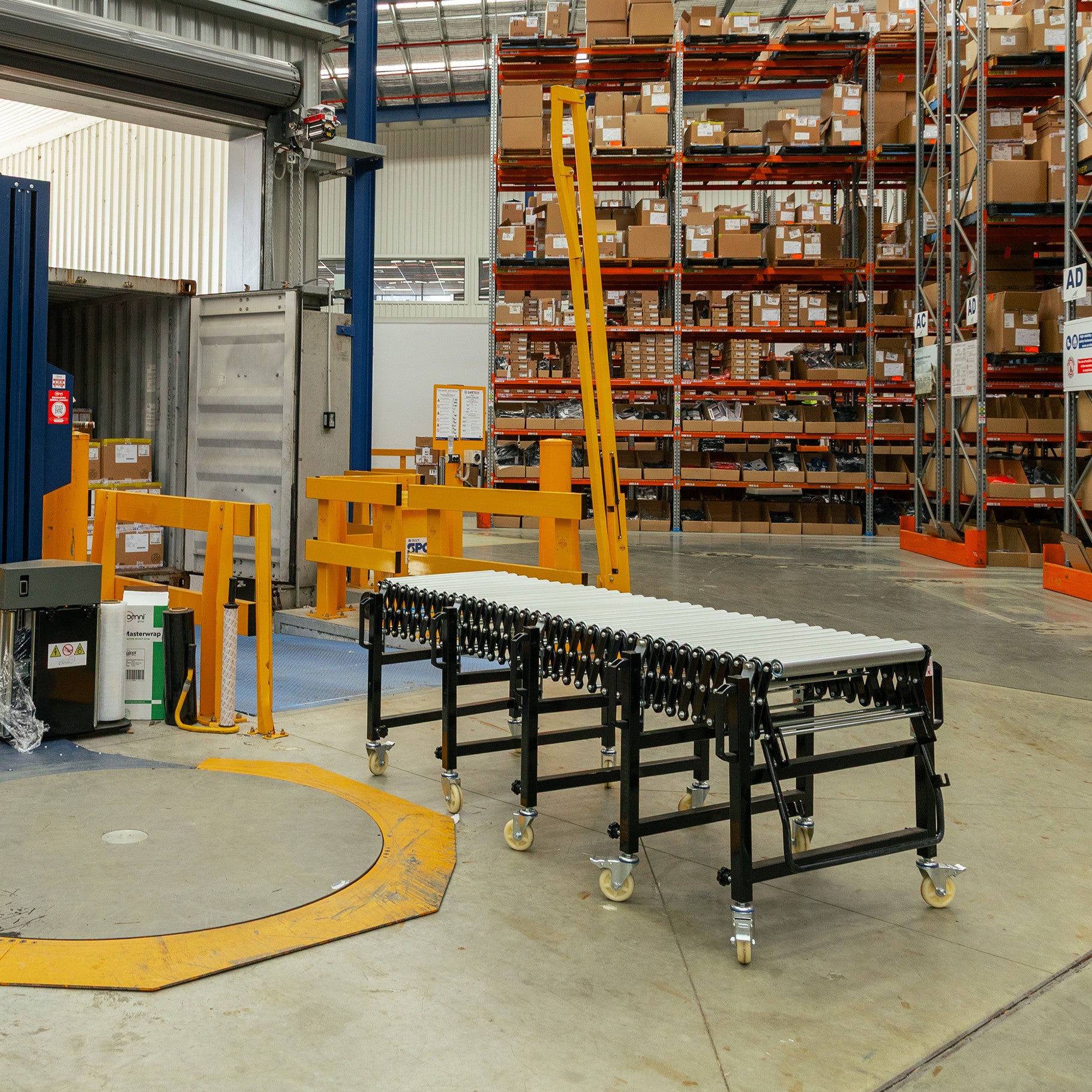 Expandable Steel Roller Conveyor 610mm W x 1.5-4.0m L - Omni Packaging 