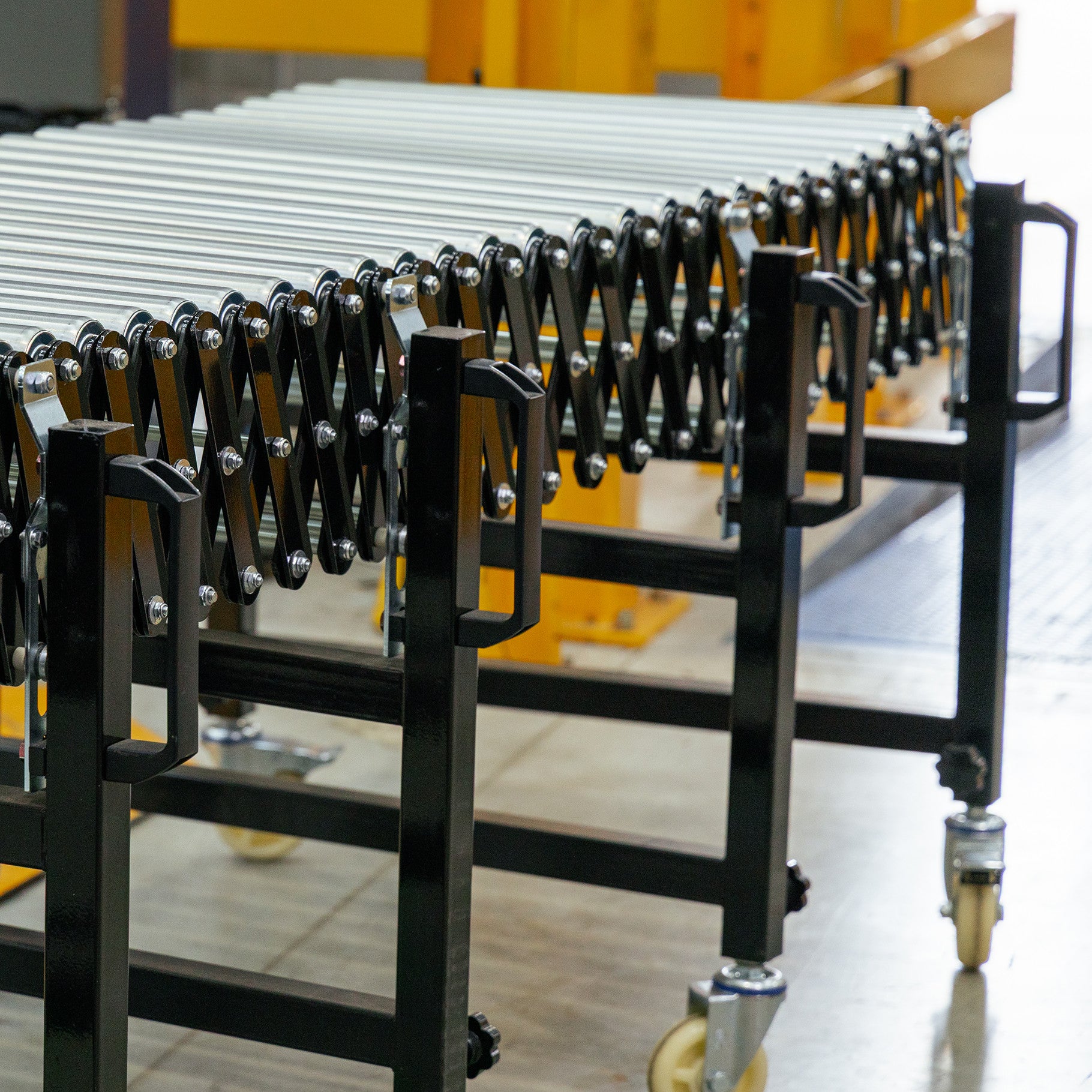 Expandable Steel Roller Conveyor 760mm W x 1.5-4.0m L - Omni Packaging 