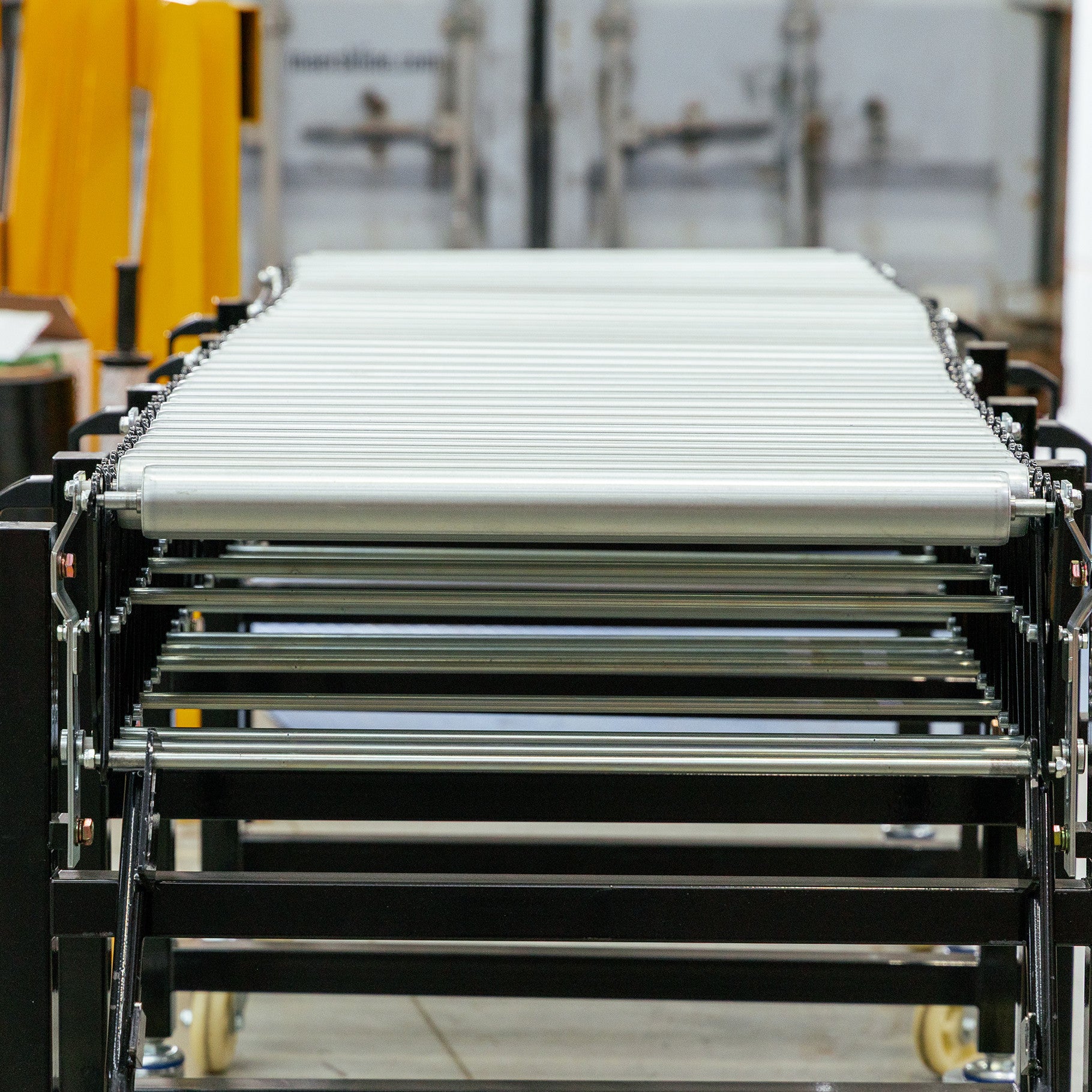 Expandable Steel Roller Conveyor 760mm W x 1.5-4.0m L - Omni Packaging 