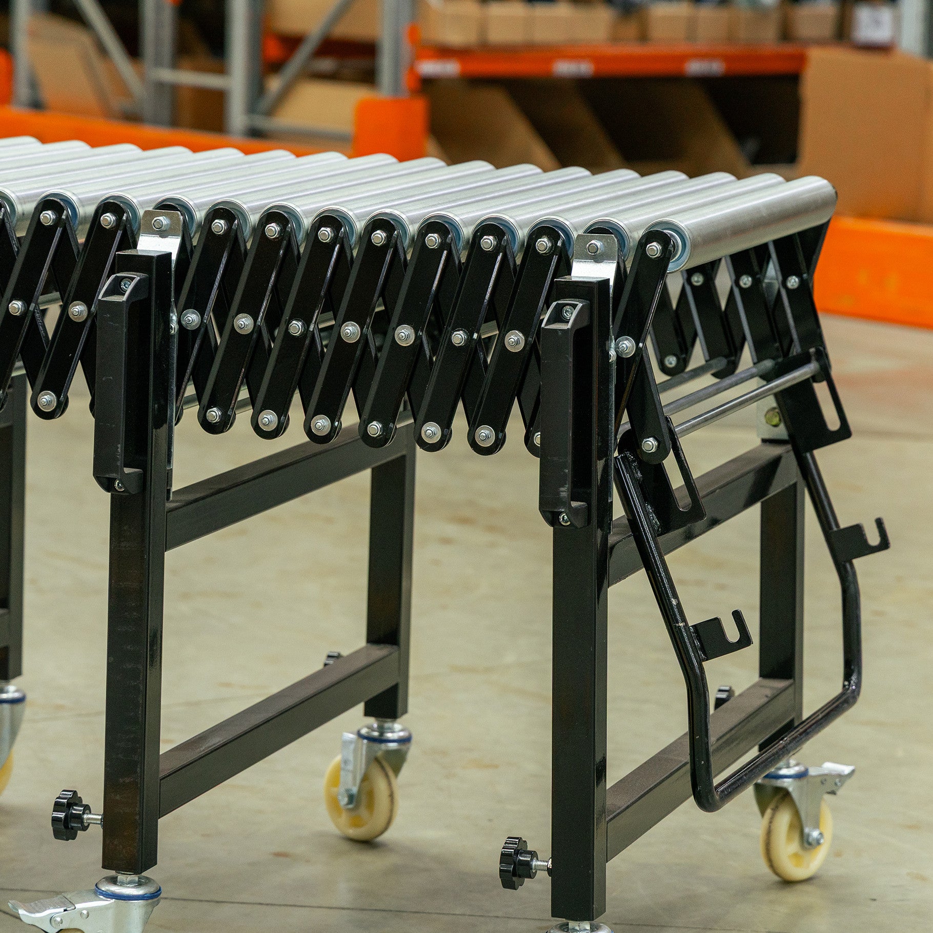 Expandable Steel Roller Conveyor 760mm W x 1.5-4.0m L - Omni Packaging 