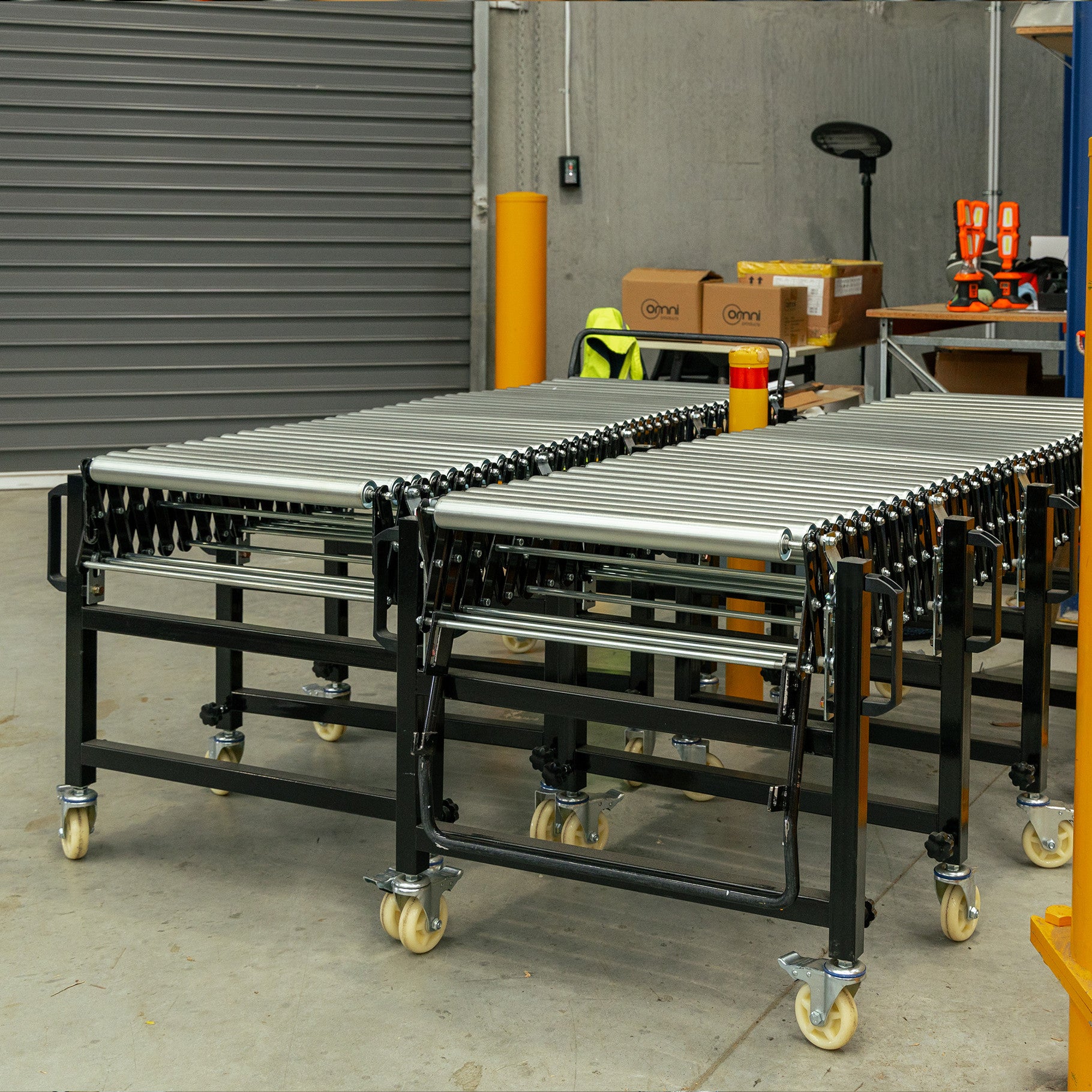 Expandable Steel Roller Conveyor 760mm W x 1.5-4.0m L - Omni Packaging 
